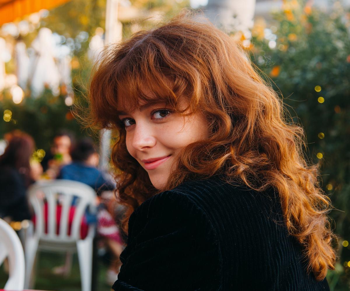 Curly Auburn Hair With Bangs