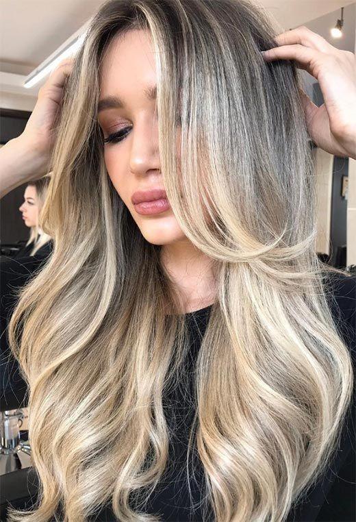 Sarı balayage uzun katlar